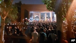 FILE - This photo taken by an individual not employed by The Associated Press and obtained by the AP outside Iran shows students of the Sharif University of Technology attending a protest in Tehran, Oct. 7, 2022. 