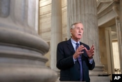 FILE - Senate Intelligence Committee member Angus King, I-Maine, speaks on Capitol Hill in Washington, Dec. 9, 2014.