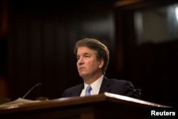 FILE - Supreme Court nominee Brett Kavanaugh testifies during the third day of his confirmation hearing before the Senate Judiciary Committee on Capitol Hill in Washington, Sept. 6, 2018.