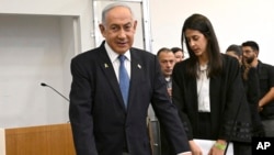 Israeli Prime Minister Benjamin Netanyahu attends the fifth day of testimony in his trial on corruption charges at the district court in Tel Aviv, Israel, Dec. 23, 2024. 