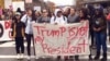 Protesters gather on the campus of the University of Connecticut to show their opposition to the election of Republican Donald Trump as president on Nov. 9, 2016 in Storrs, Conn.