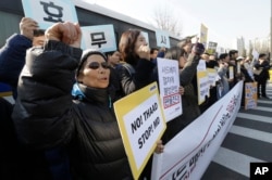 South Korean protesters stage a rally to oppose a plan to deploy an advanced U.S. missile defense system called Terminal High Altitude Area Defense, or THAAD, in front of the defense ministry in Seoul, South Korea, Feb. 28, 2017.
