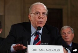 FILE - Then-acting CIA Director John McLaughlin appears before the Senate Armed Services Committee on Capitol Hill in Washington, Aug. 17, 2004, to discuss proposed reorganization of the intelligence community.