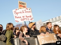 People gather to demonstrate against Iceland's prime minister Sigmundur David Gunnlaugsson, in Reykjavik on Monday April 4, 2016.
