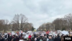 Xwepêşandan Washington D.C. li Dij Komkijiya li Dij Elewiyan li Sûriyê