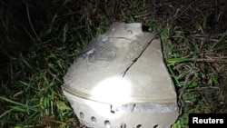 Debris that locals claimed to be part of a missile is pictured at the site of an explosion in Przewodow, a village in eastern Poland near the border with Ukraine, Nov. 16, 2022.