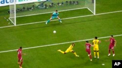 Ecuador's Enner Valencia heads the ball to score his team's second goal during the World Cup group A soccer match between Qatar and Ecuador, at the Al Bayt Stadium in Al Khor , Qatar, Nov. 20, 2022. 