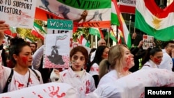 Members of London's Iranian community demonstrate for women's rights and against the government in Tehran, in London, Nov. 19, 2022. Protests also took place at Iranian universities and cities across Iran.