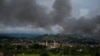 Black smoke from continuing military air strikes rises above a mosque in Marawi city, southern Philippines, June 9, 2017.