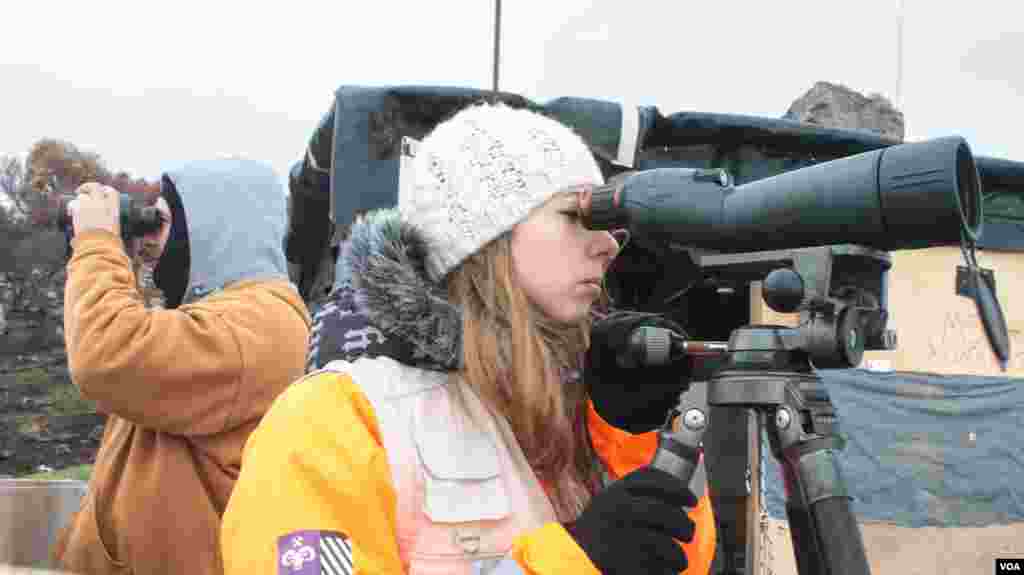 The volunteers on Lesvos, Greece, stay vigilant outside their hut for any boat crossings made by refugees. (J. Owens/VOA)