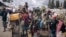War-displaced people flee toward the city of Goma, Democratic Republic of Congo, on Nov. 15, 2022.