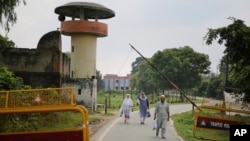 Kashmiris leave the Agra Central Jail premise after meeting a relative lodged in the jail, in Agra, India, Sept. 20, 2019.