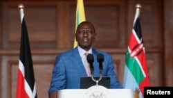 Kenya's President William Ruto addresses the nation to announce new cabinet secretaries in his government, in the wake of nationwide protests over new taxes, at State House in Nairobi, Kenya, July 19, 2024.