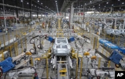 A car frame is being welded by robots at a Vinfast factory in Hai Phong, Vietnam on Sept. 29, 2023.