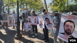 Dozens of Uzbek immigrants demand justice from President Shavkat Mirziyoyev during the U.N. General Assembly's annual session in New York, Sept.20, 2023.