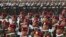 FILE - Military officers march during a parade in Naypyitaw, Myanmar, March 27, 2023. The country's military government revealed last week how it will implement its newly activated conscription law.