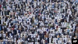 Muslim devotees offer Eid al-Fitr prayers to mark the end of Ramadan, the Islamic holy month of fasting, in Nairobi, Kenya, Apr. 10, 2024.