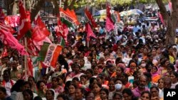 Members of various trade unions and opposition political parties gather in support of countrywide rural strike called by farmers in Hyderabad, India, Feb. 16, 2024. 