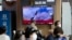 A TV screen shows an image of North Korea's missile launch during a news program at the Seoul Railway Station in Seoul, South Korea, July 12, 2023. 