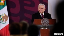 FILE - Mexico's President Andres Manuel Lopez Obrador speaks during a press conference at the National Palace in Mexico City, Jan. 29, 2024. (Mexico Presidency/Handout via Reuters)