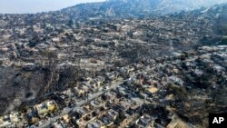 A view of neighborhoods burned during forest fires in Vina del Mar, Chile, Feb. 5, 2024.