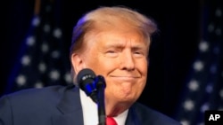 Republican presidential candidate former President Donald Trump speaks at a caucus night rally in Las Vegas, Feb. 8, 2024.