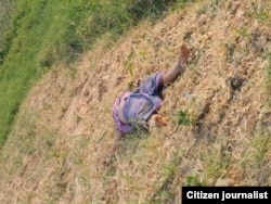 The dead body of a woman in the village of Nyaung Yin, Myinmu township.