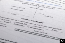 FILE - The criminal complaint against Jack Teixeira, April 14, 2023