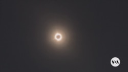 Massive crowds watch total solar eclipse over US