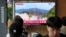 A TV screen shows a file image of North Korea's missile launch during a news program at the Seoul Railway Station in Seoul, South Korea, July 19, 2023. North Korea fired two short-range ballistic missiles into its eastern sea early Wednesday.