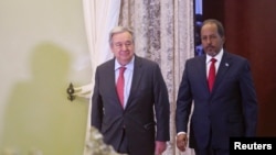 UN Secretary-General Antonio Guterres and Somali President Hassan Sheikh Mohamud arrive for a joint news conference at the Presidential palace in Mogadishu, Apr. 11, 2023.