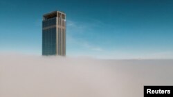 Qozog'iston poytaxti Ostonadagi Abu Dabi Plaza binosi bulutlardan ham baland 