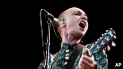 FILE - Irish singer-songwriter Sinead O'Connor performs on the first night of the Toender Folk Music Festival in Toender, Denmark, Aug. 23, 2013. O’Connor has died at 56, her family said July 26, 2023.