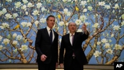 California Governor Gavin Newsom, left, stands next to Beijing Party Secretary Yin Li during a meeting in Beijing, Oct. 26, 2023. Newsom was on a weeklong tour of China.