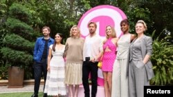 Actors Michael Cera, America Ferrera, Ryan Gosling, Margot Robbie, Issa Rae, Kate McKinnon and director Greta Gerwig pose for pictures during a photocall for the upcoming Warner Bros. movie "Barbie" in Los Angeles, California, June 25, 2023. 