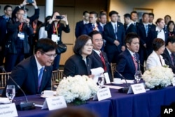 Taiwan President Tsai Ing-wen, second from left, attends a bipartisan leadership meeting at the Ronald Reagan Presidential Library in Simi Valley, Calif., April 5, 2023.
