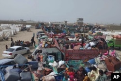Afghans wait for clearance to depart for their homeland at a deportation camp setup by authorities for people living in Pakistan illegally, in Chaman, a town on the Pakistan-Afghanistan border, Nov. 1, 2023.