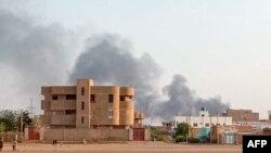 Smoke billows in the distance around the Khartoum Bahri district amid ongoing fighting in Sudan on July 14, 2023. 