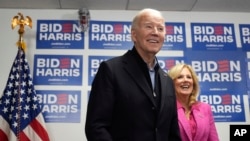 FILE - President Joe Biden waits to speak as first lady Jill Biden stands by his side at Biden's campaign headquarters in Wilmington, Delaware, Feb. 3, 2024.