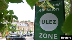 Signage indicates the boundary of London's Ultra Low Emissions Zone (ULEZ) zone along the North Circular Road ahead of proposed upcoming expansion, in London, Britain, June 26, 2023.