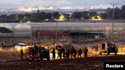 Israeli forces walk, as an Israeli military operation continues on Jenin refugee camp in the Israeli-occupied West Bank, July 4, 2023. 