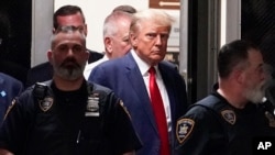 FILE - Former President Donald Trump arrives for his arraignment at Manhattan Federal Court in New York, April 4, 2023. 