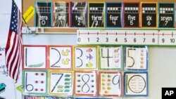 FILE - Instructional materials are posted on a wall of a kindergarten class in Maryland on Jan. 24, 2023. 