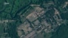 This satellite image provided by Planet Labs PBC, taken June 30, 2023, shows recent construction of tents at a former military base outside the Belarusian town of Osipovichi.