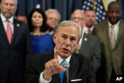 FILE - Texas Gov. Greg Abbott speaks after signing one of several bills at the Texas Capitol in Austin, Texas, June 6, 2023.