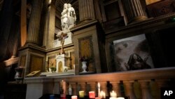 FILE - The 'Our Lady of Athletes' chapel in seen inside the Madeleine church, May 30, 2024 in Paris.