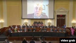 In this image made from video, Peter Humphrey tells the House Select Committee on the Chinese Communist Party about being jailed for to years while doing business in China, during the committee's hearing on July 13, 2023, in Washington.