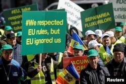 Romanian farmers protest outside the European Commission's Offices over the price of grains, in Bucharest, Romania, April 7, 2023. (Inquam Photos/George Calin via Reuters)