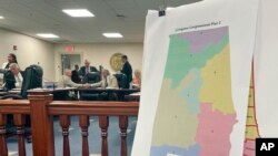 FILE - A map of a GOP proposal to redraw Alabama's congressional districts is displayed in Montgomery, Alabama, July 18, 2023. On Tuesday, the U.S. Supreme Court upheld a decision mandating Alabama create a second congressional district in which Black voters are the majority.
