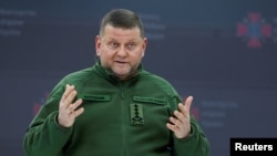 FILE - Commander in Chief of Ukraine's Armed Forces General Valerii Zaluzhnyi holds a press conference, amid Russia’s invasion of Ukraine, in Kyiv, Dec. 26, 2023.